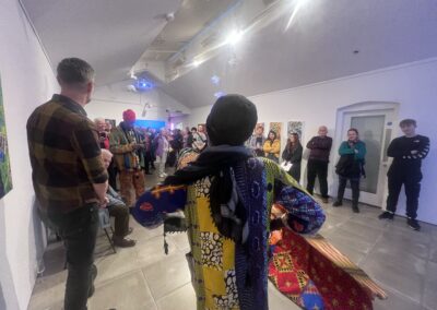 Kwame from African Activities and Mark from SPUD speak to a diverse audience at the Nightjar opening night.